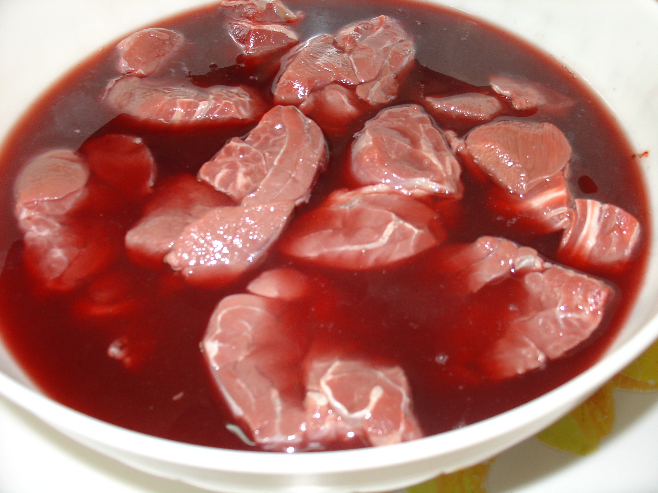 Brasato di carne marinata ( con vino rosso di Troia )