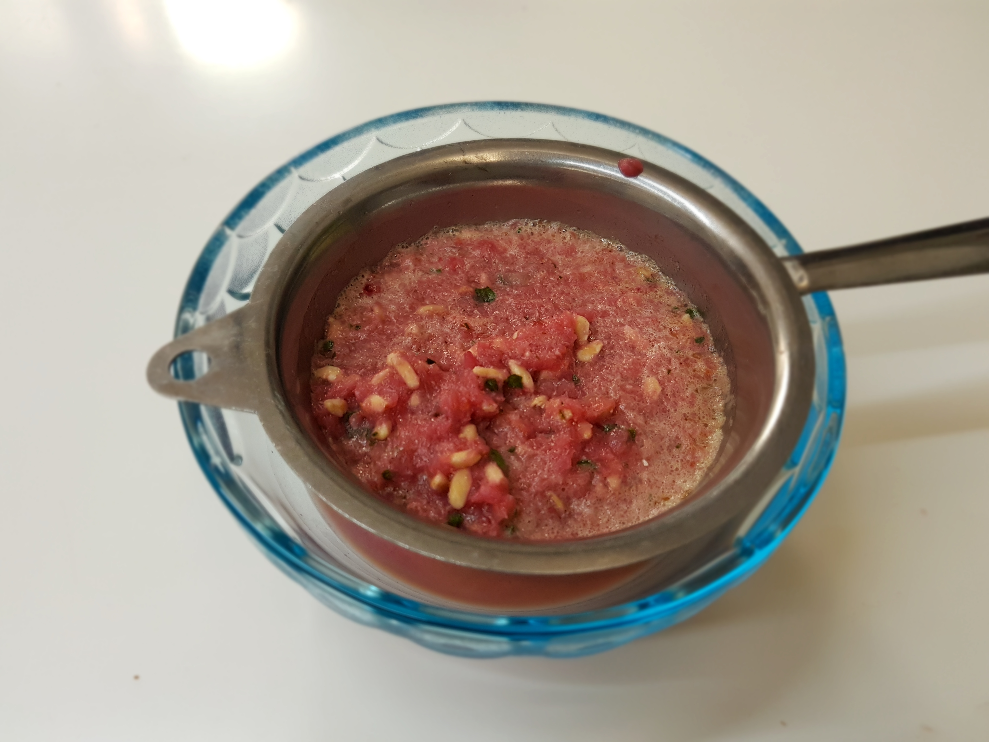 Risotto con baccalà mantecato al succo di melagrana