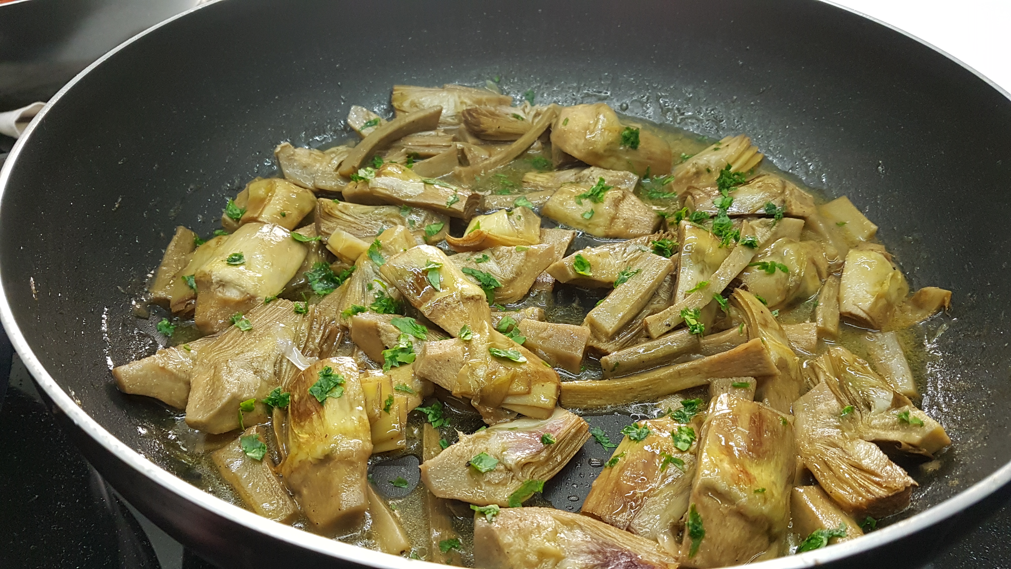 Scaloppine di vitello con carciofi all'arancia