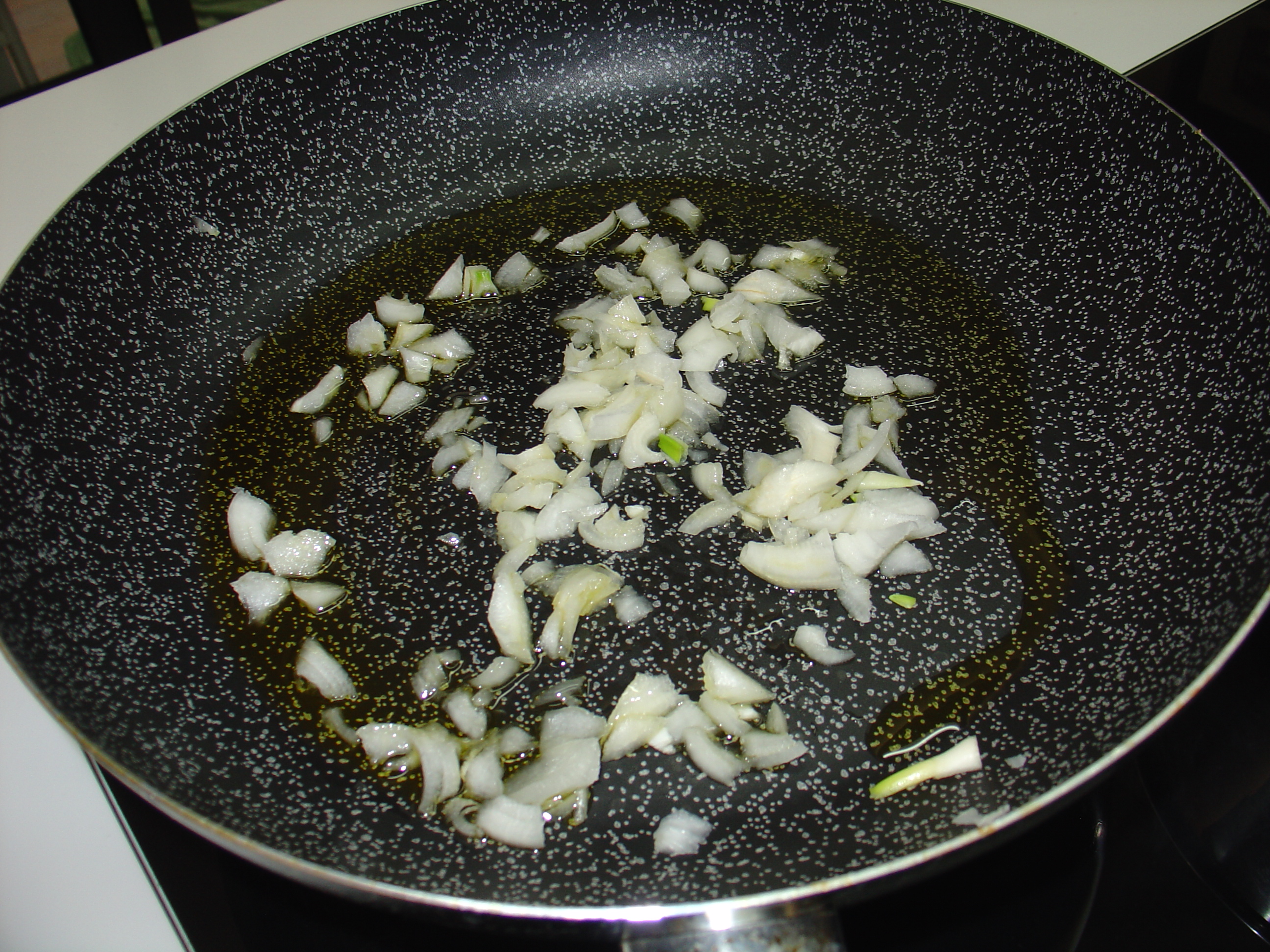 Spaghetti risottati con funghi e zafferano