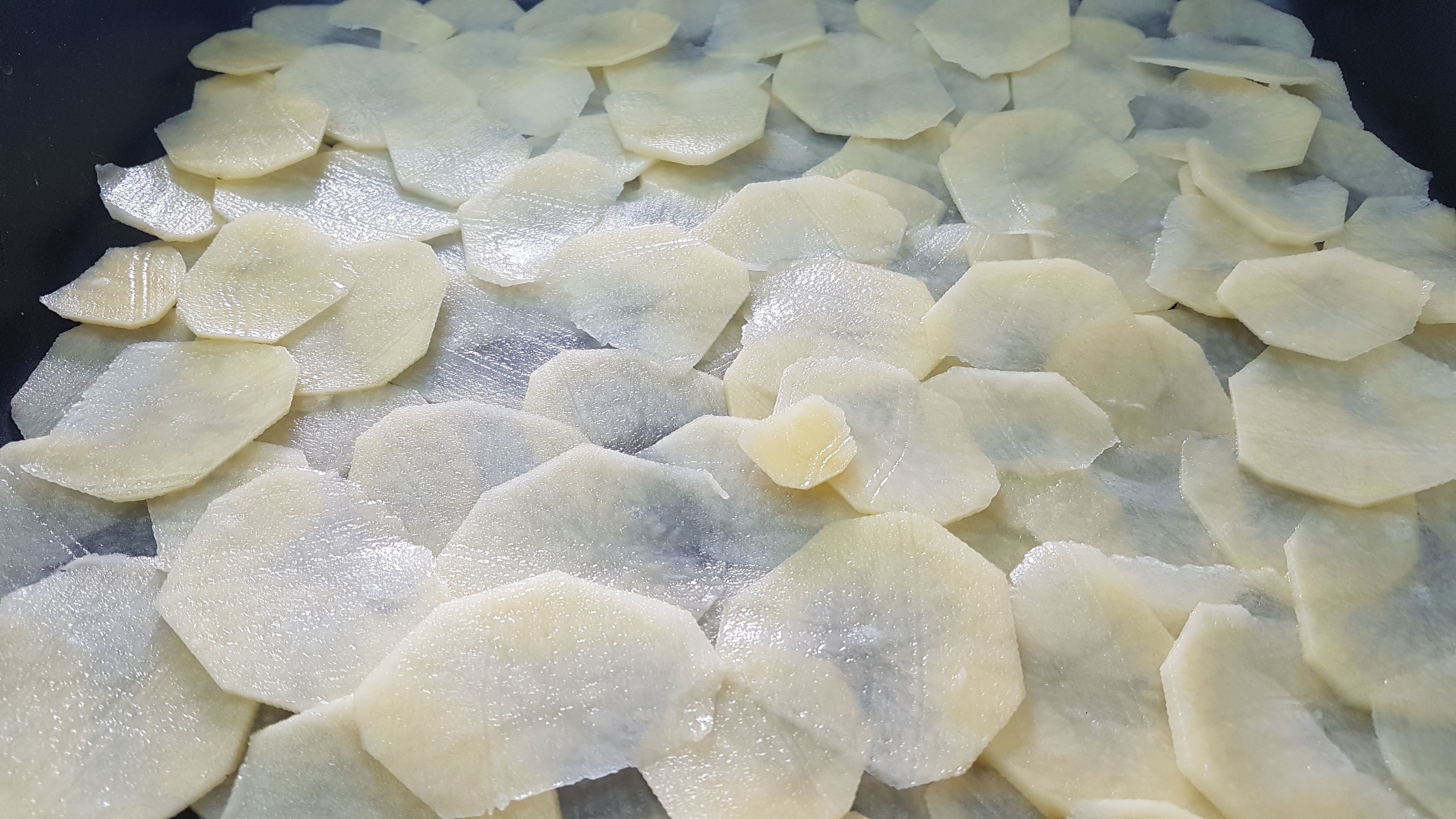 Spigola in crosta con patate